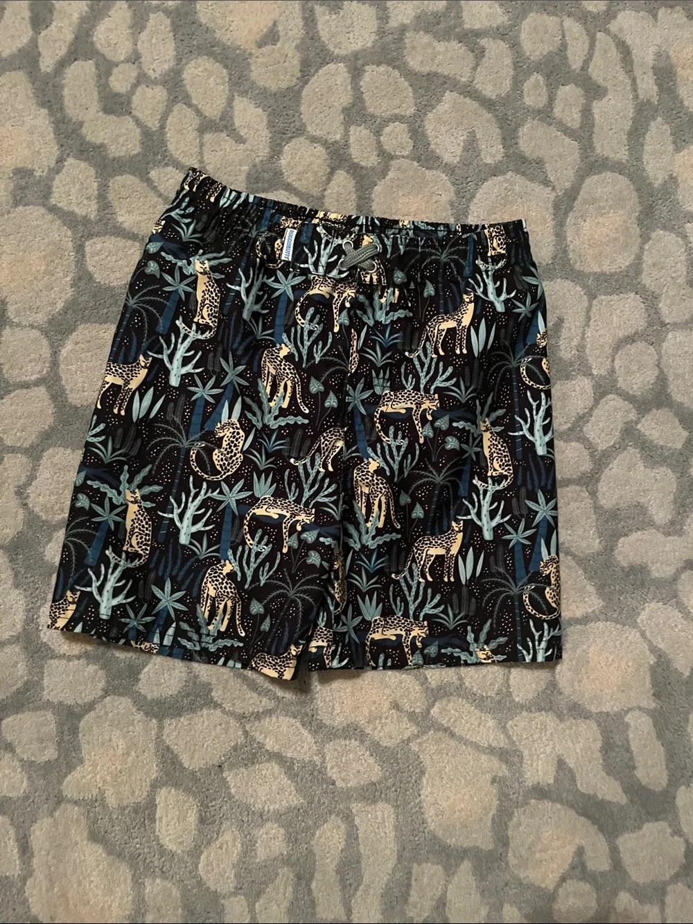 Ruffle Butts Black Swim Trunks with Teal and Gold Leopard Print